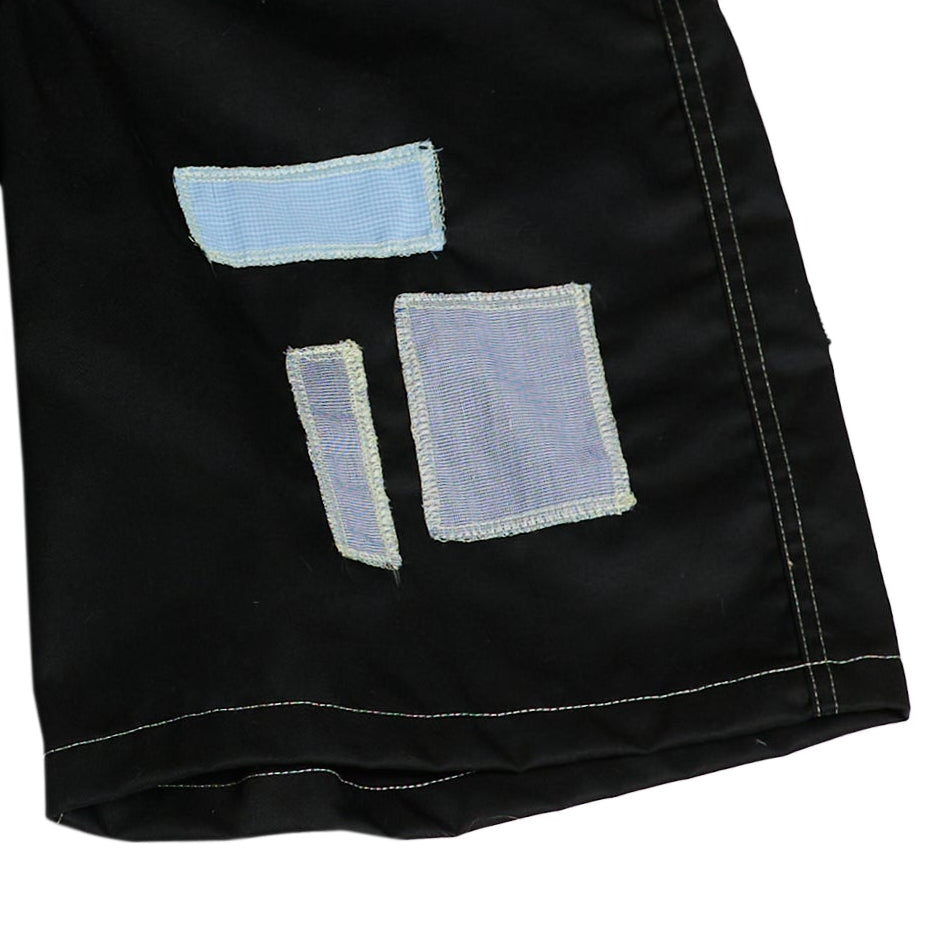 SHORTS LAAARGOS CON PARCHES / negro