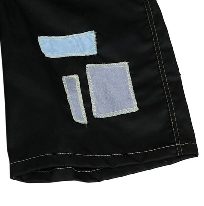 SHORTS LAAARGOS CON PARCHES / negro